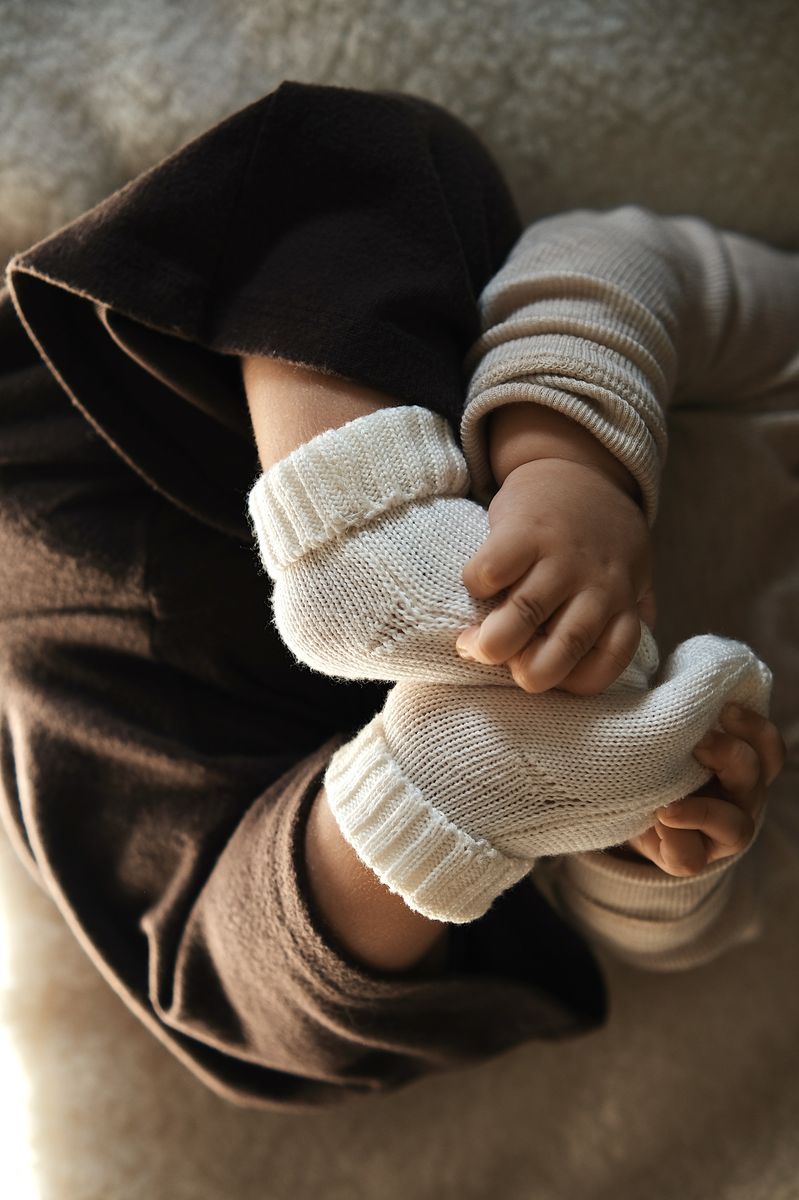 Hoe je baby aankleden tijdens verschillende seizoenen: hoeveel laagjes heeft je baby nodig?
