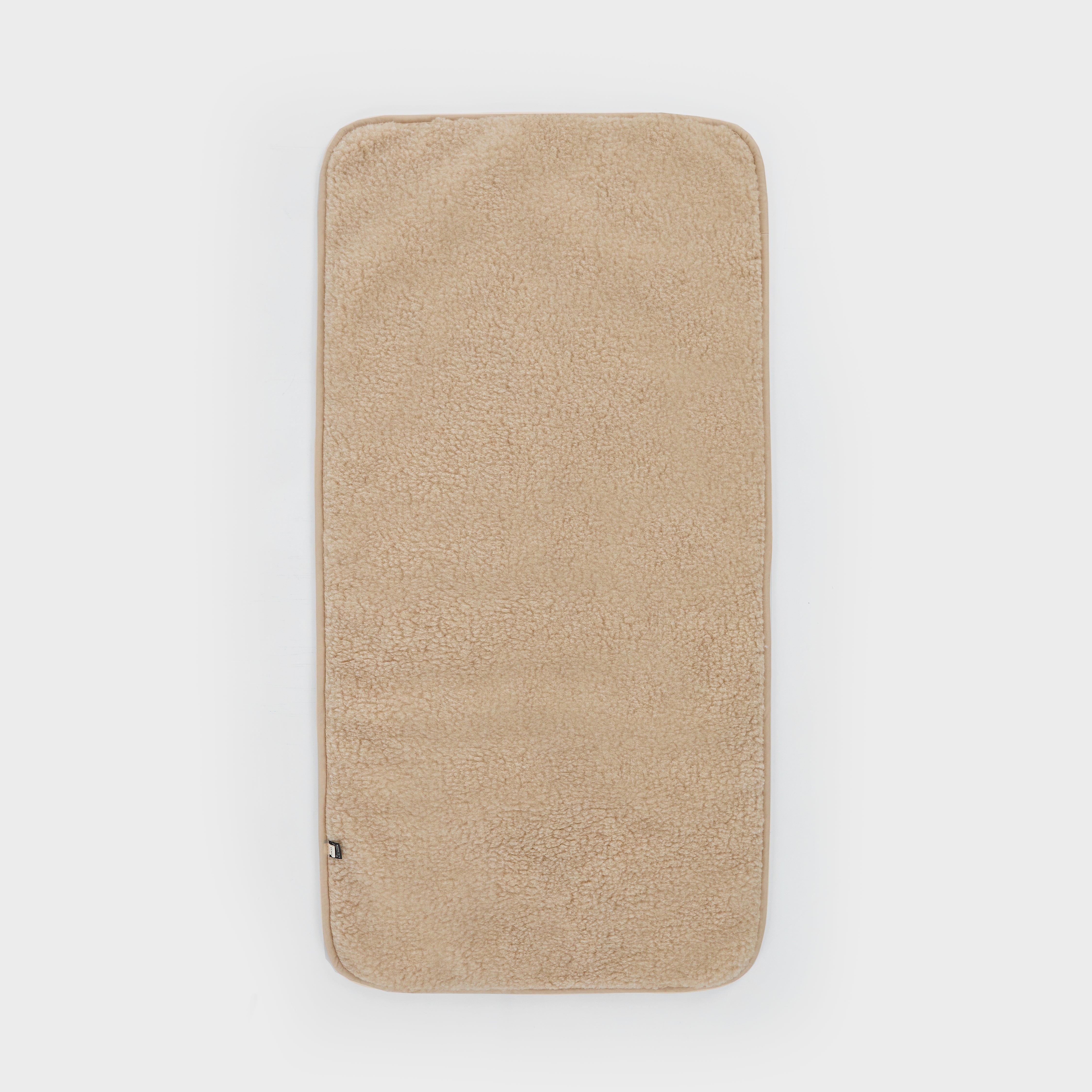 Wollen onderlegger baby van merinowol – ademend, temperatuurregulerend en perfect als basislaag of matrastopper.